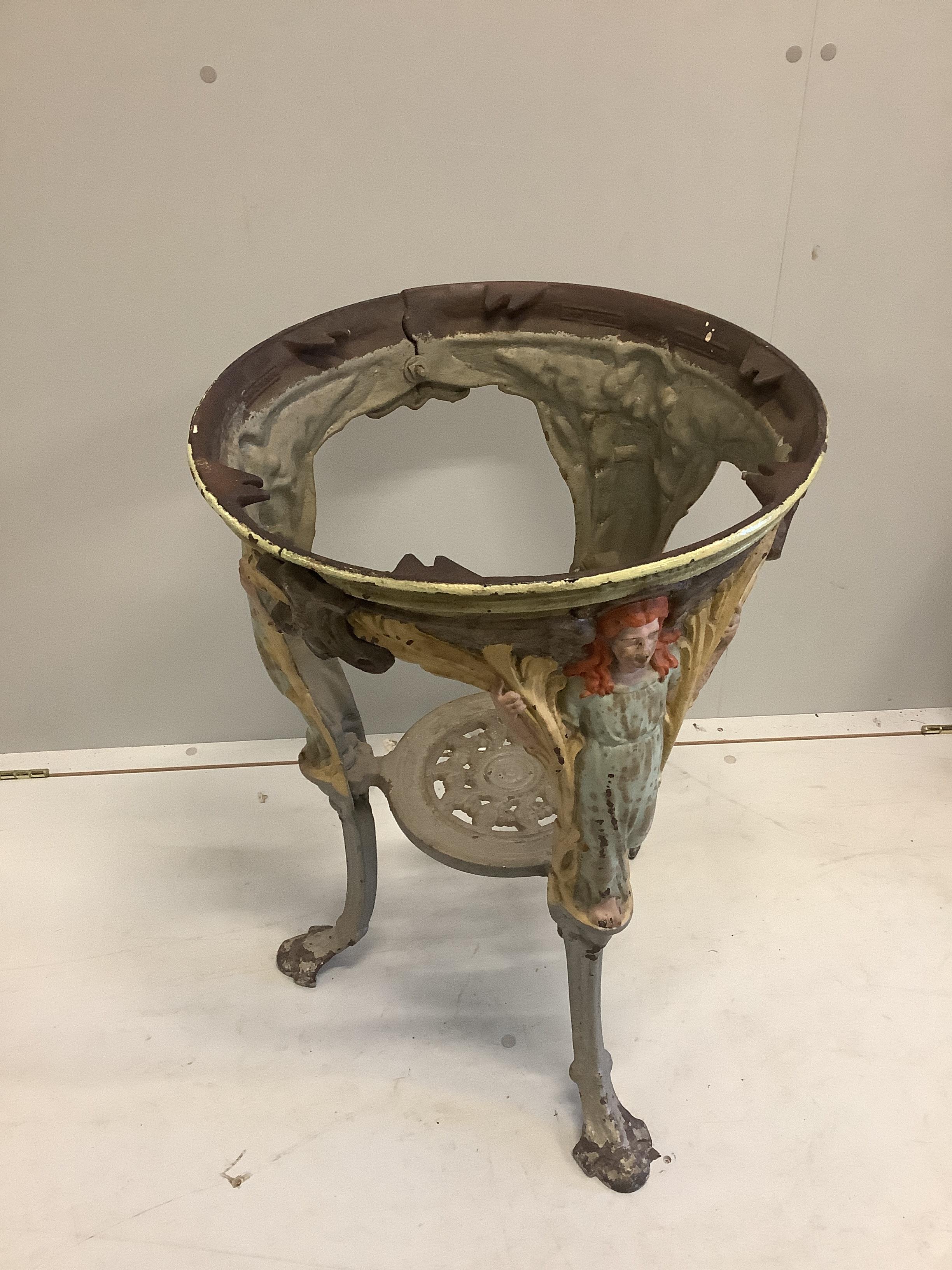 A Victorian circular painted cast iron pub table, diameter 55cm, height 76cm